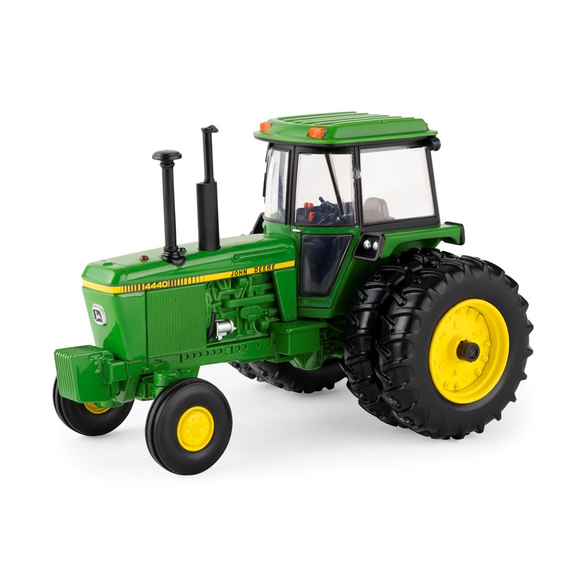 Green and yellow John Deere 4440 tractor model with rear dual tyres on a white background