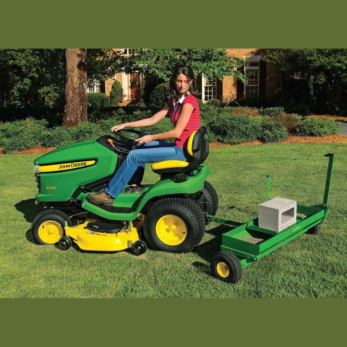 John Deere 40inch Tow-behind Spike Aerator & Spreader for Ride-on Mowers - RDO Equipment