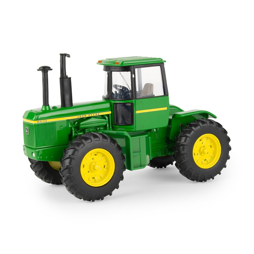 Green and yellow John Deere 8630 tractor model with single tyres on a white background