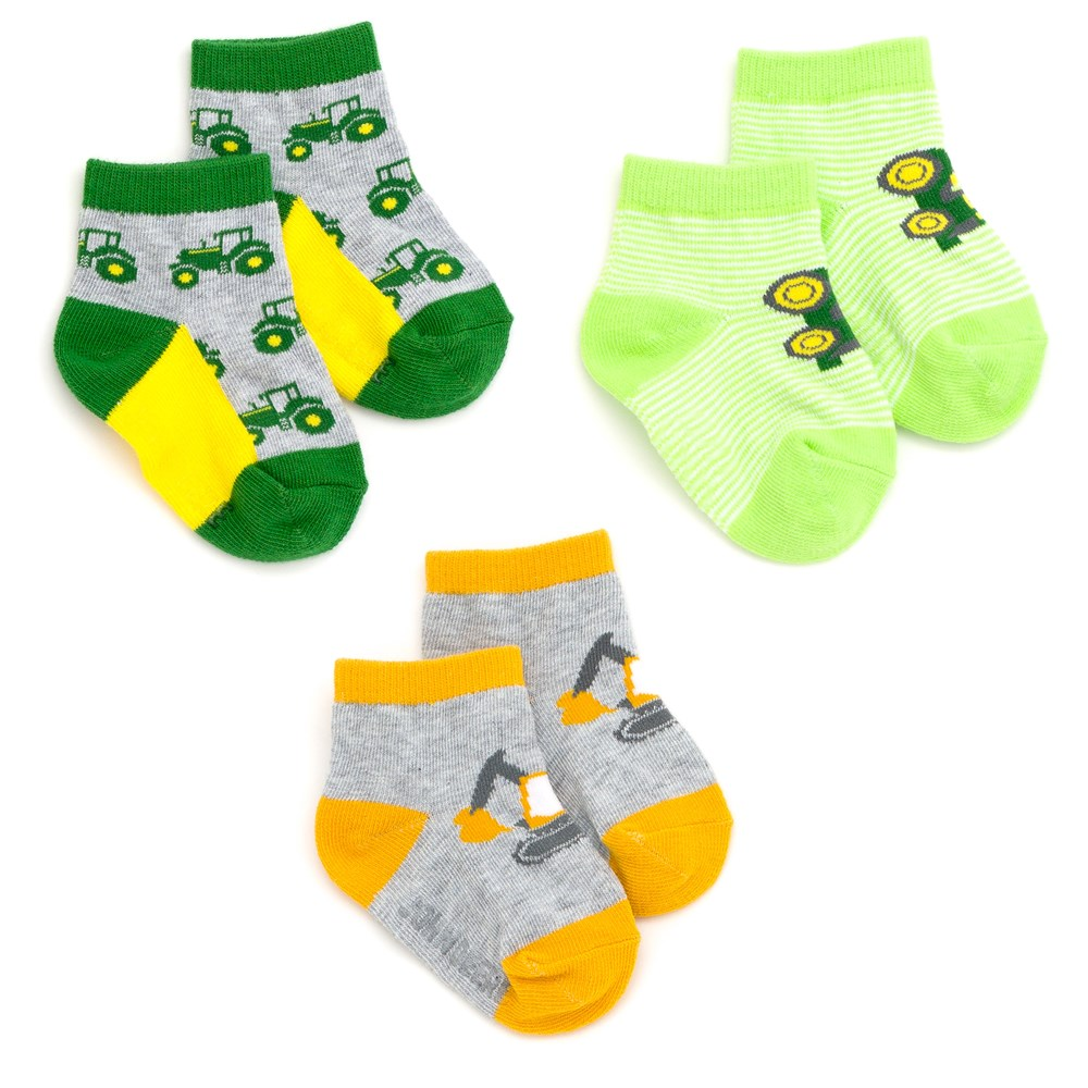 Three pairs of John Deere baby shortie socks featuring green tractors and yellow excavator designs
